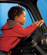 Boy in car